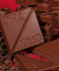 RSO edibles, Indica milk chocolate, milk chocolate squares, Rick Simpson Oil, 100mg THC, cannabis edibles, full-spectrum RSO, creamy edibles, relaxation chocolate, sleep aid edibles, 10mg THC squares, Indica RSO chocolate, Encore edibles, medical cannabis treats